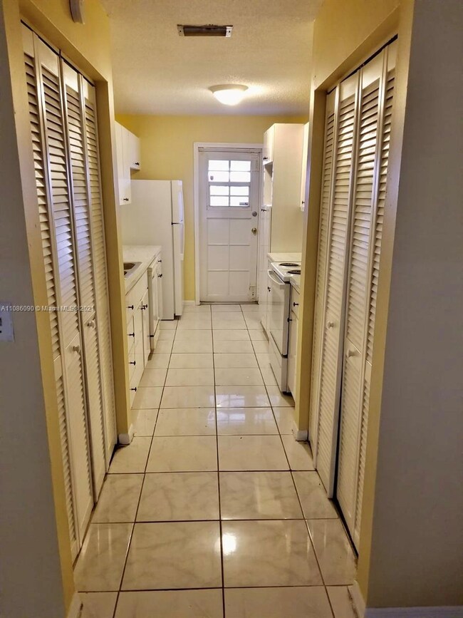 Galley kitchen entry, pantry & storage 