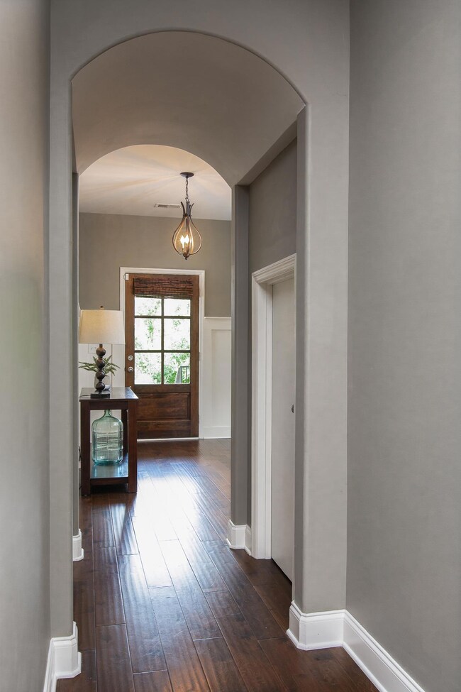 Looking into the entry with the barrel ceilings from the hallway.