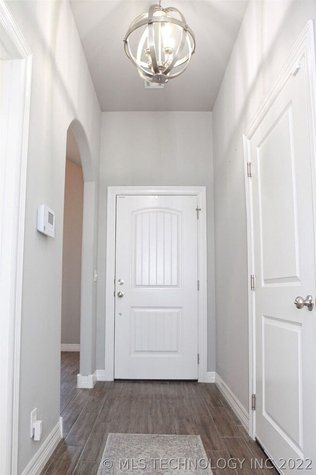 Elegant entry with hall closet.