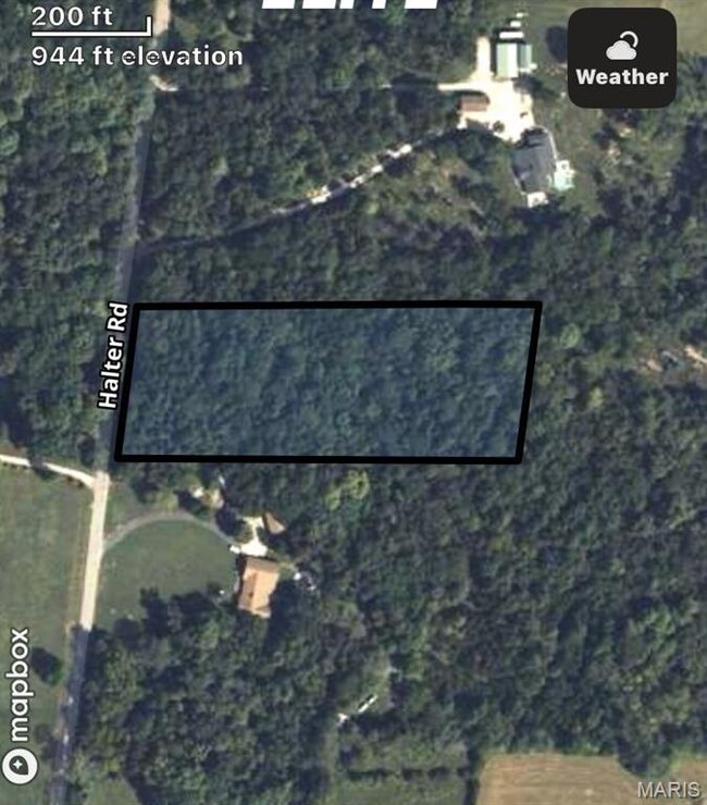 Aerial map of property and surrounding area with property parcel outlined