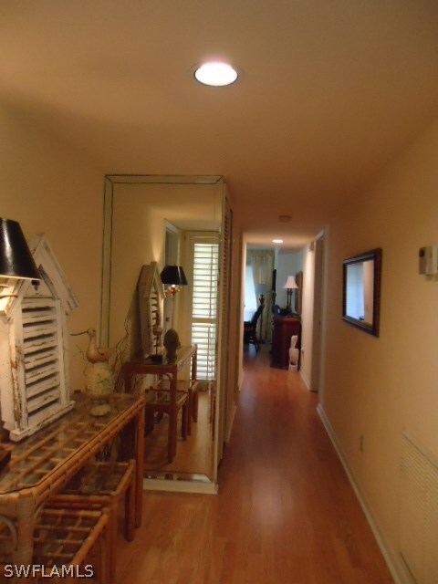 Foyer leads into kitchen and living spaces.  Guest