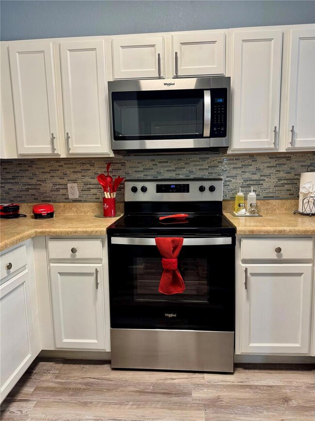 Secret Lake Resort unit 402, Kissimmee, FL 34747 - photo 2