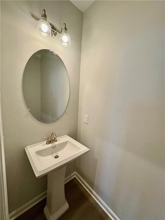 Bathroom featuring baseboards