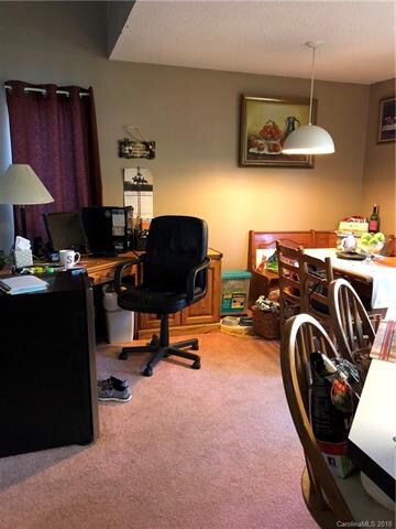 Large dining room with enough room for a desk area