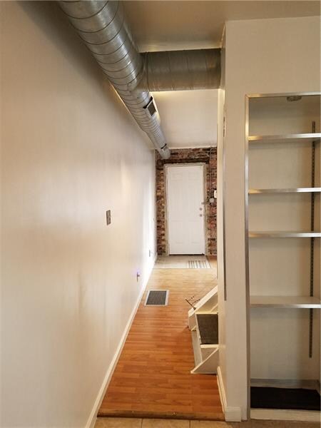 Loft-style exposed duct work is harmonious and eff