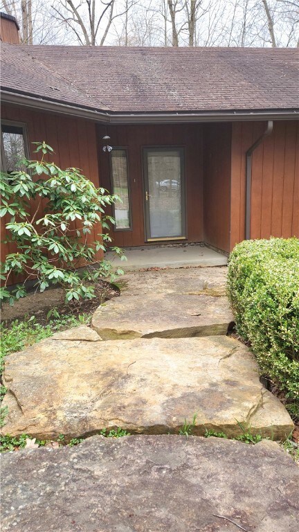 Dramatic overized flagstones welcome you
