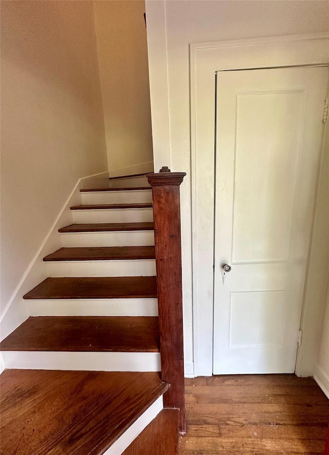 Stairs with wood finished floors