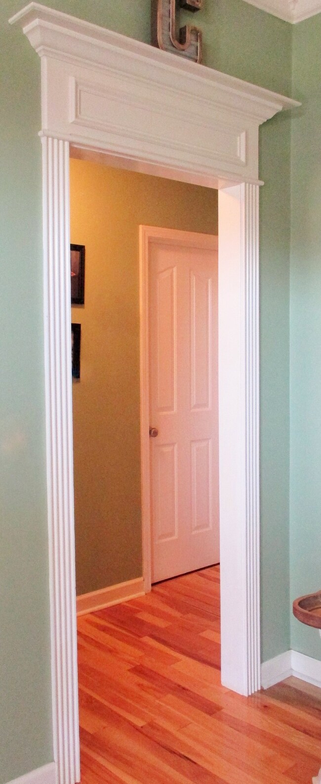 Both doorways have heavy cased openings