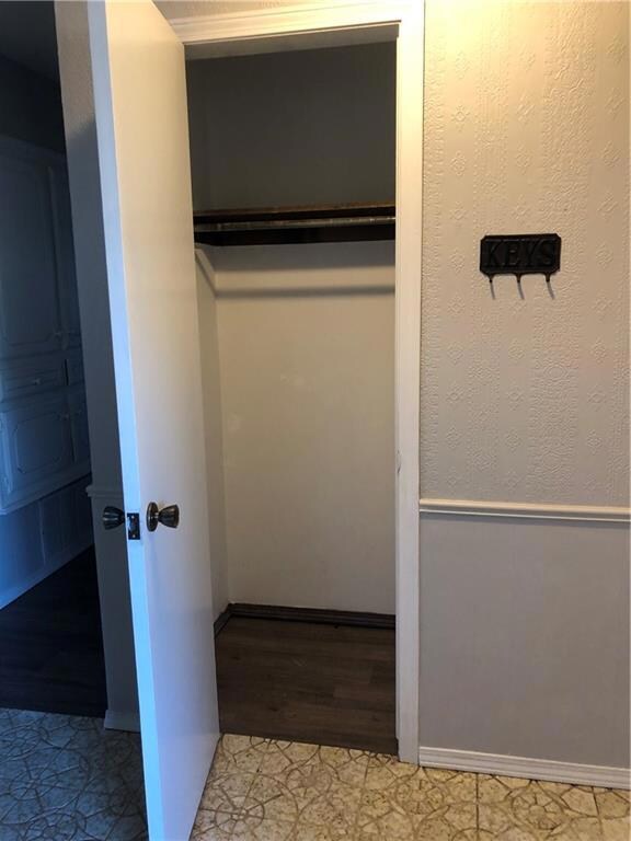 Coat closet in entry.