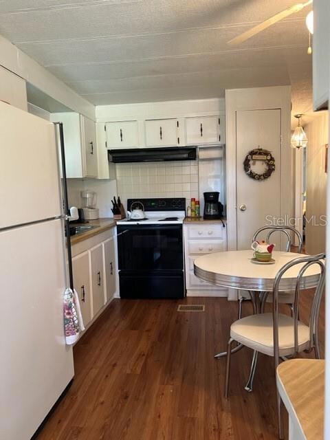 Kitchen area showing closet pantry and eat-in area