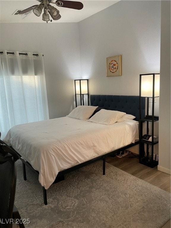 Bedroom featuring wood finished floors and ceiling