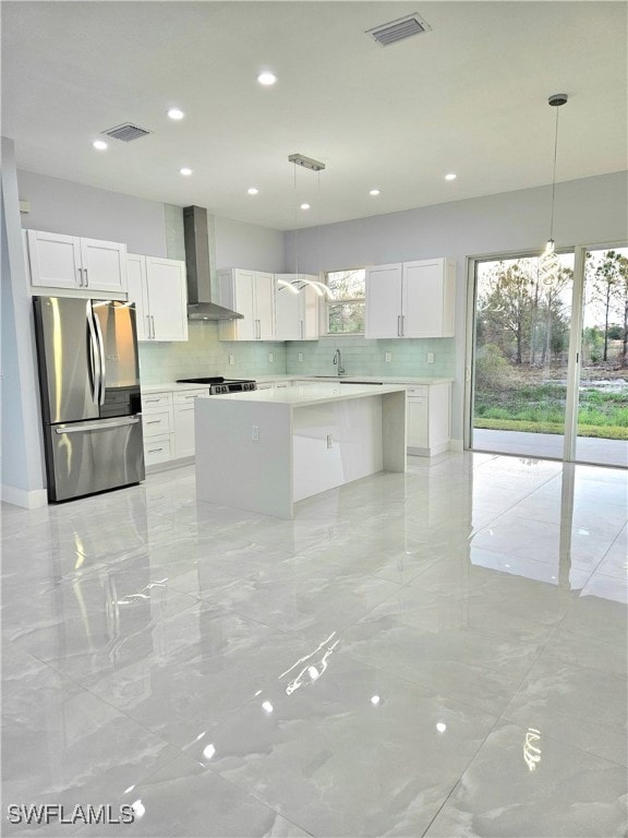 Kitchen featuring appliances with stainless steel