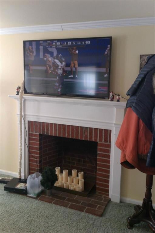 Living room brick fireplace