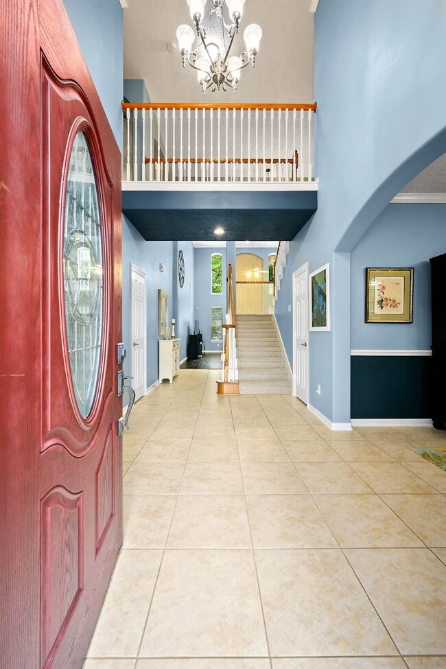 Inviting 2-story foyer greets you upon entry with formal dining room to the right and study to the left.