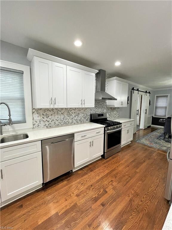 Kitchen with white cabinets.