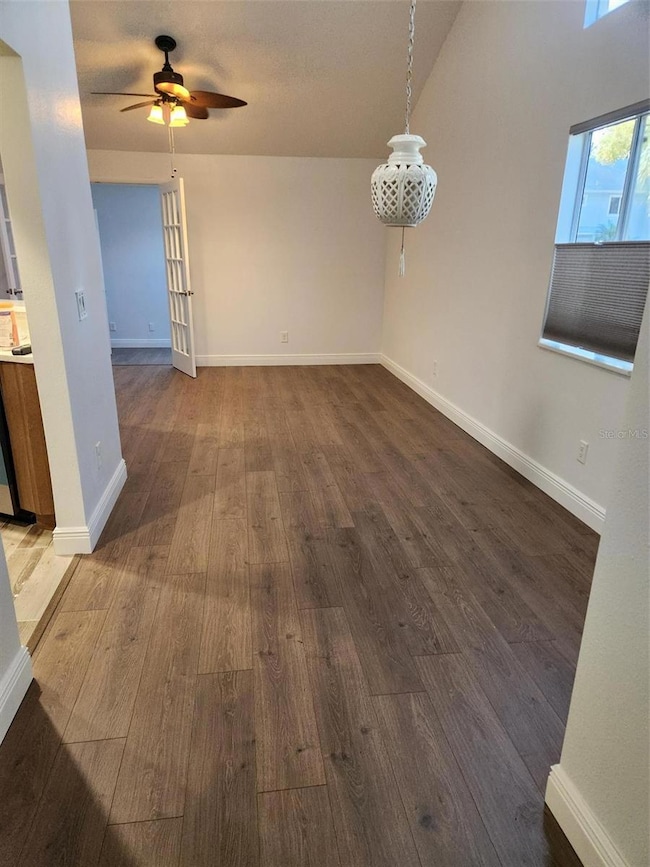 From foyer to open dining and living and french doors to bonus room