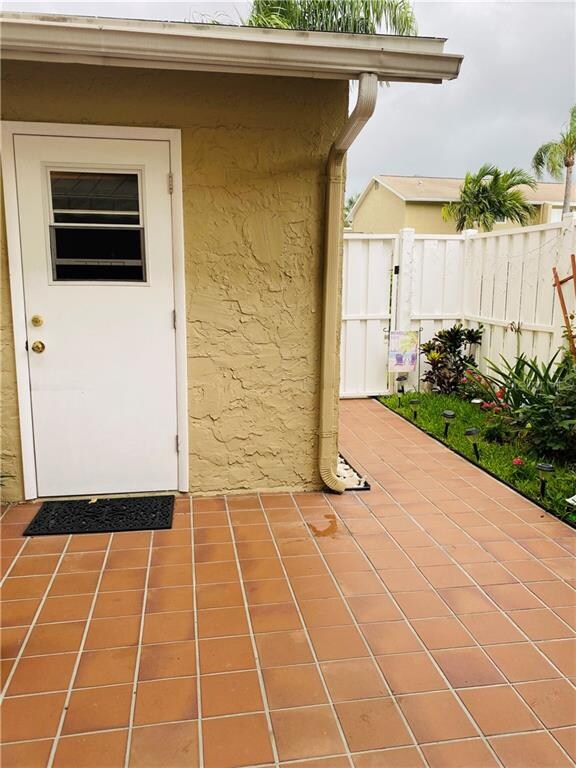 Courtyard View to Two Car Garage Entrance