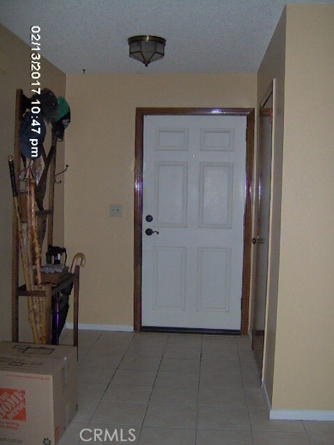 Tiled entry from courtyard