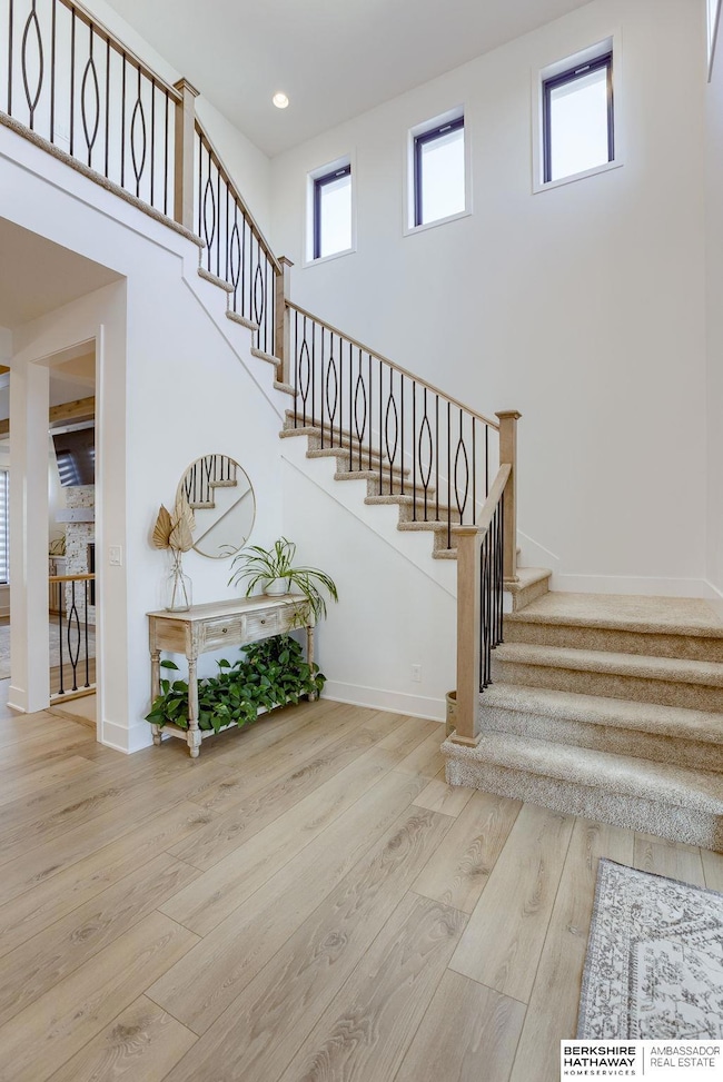 A light and bright home. I love the staircase!