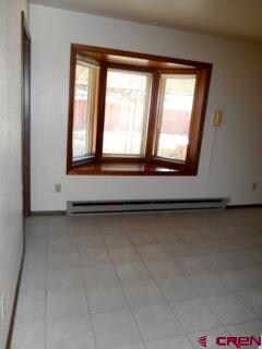 Dining area of the kitchen has a bay window overlo