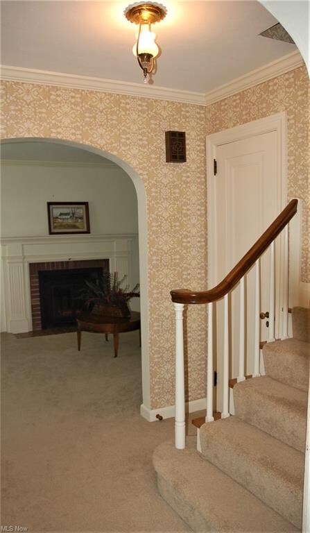 LARGE WELCOMING FOYER LEADING TO HUGE LIVING ROOM,