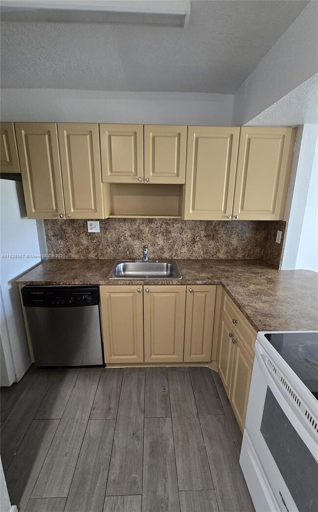 11110 SW 196th St unit A409, Cutler Bay, FL 33157 - photo 2