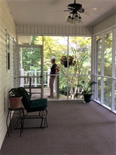 Screened porch 57 ft. with balcony to Master Bedro