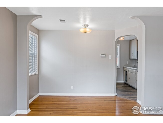 Dining area with arched entryways