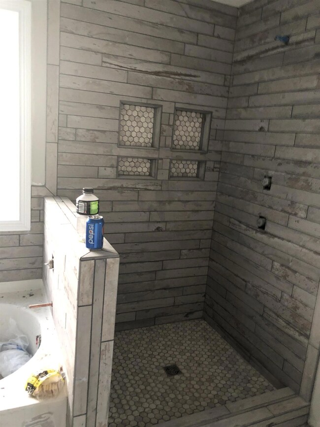 Given the right hot water tank, I think it would be possible to live in this shower.