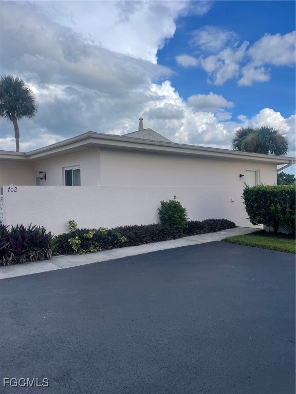 View of home's exterior featuring stucco siding