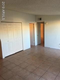 Ceramic tile throughout