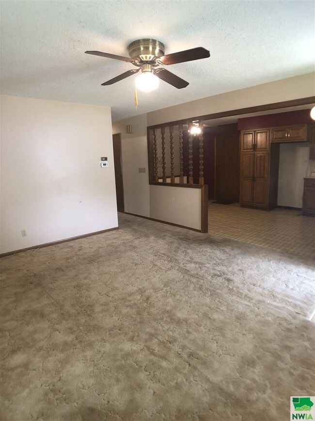 You come into the living room from the front door.