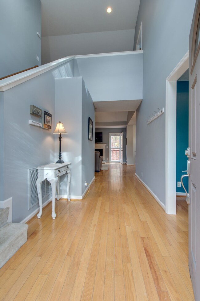Sand and Finish hardwood floors at entry.