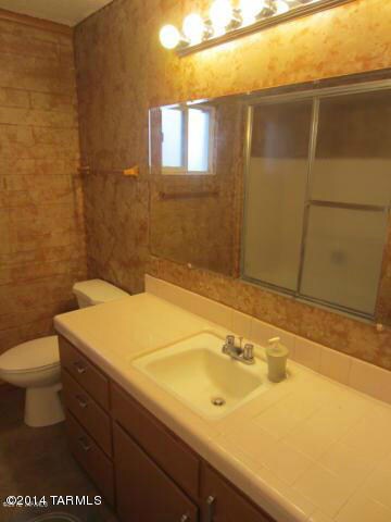 One of the bathrooms Upstairs Unit