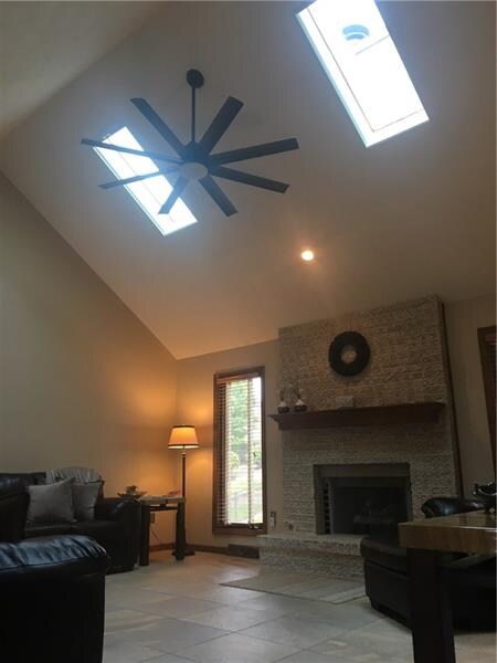 The soaring 2 story cathedral ceilings captivate y
