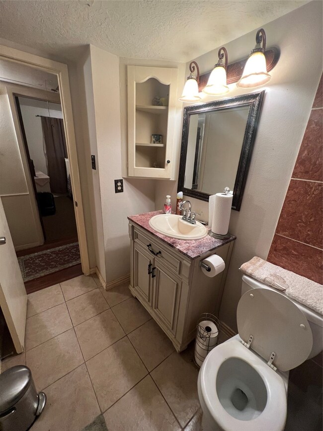 1442 Peach Spring Dr, Houston, TX 77088 - photo 5