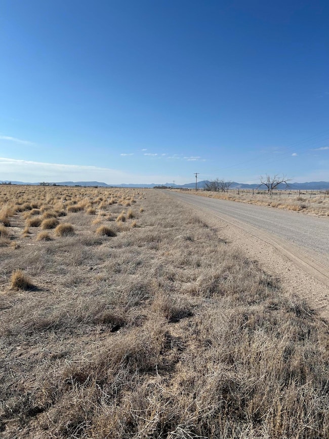 Facing west along road