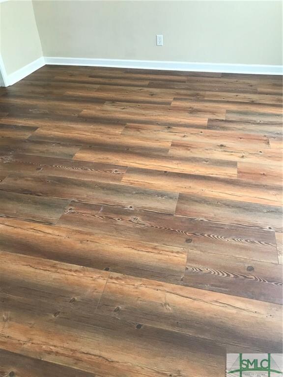 New wide, luxury vinyle plank flooring installed i