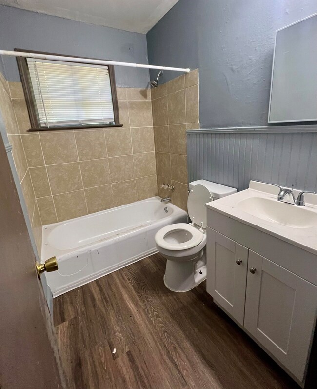 Full bathroom featuring vanity, tiled shower / bat