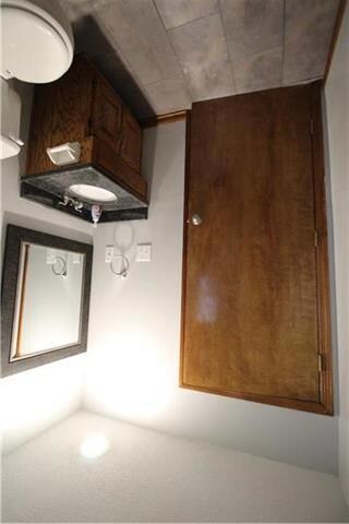 First Floor 1/2 Bath next to Laundry room