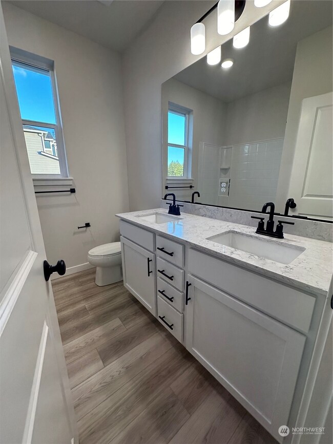 Secondary Bathroom Disclaimer: These photos are of another Aurora Home in community. Depictions of home, layout, location or other features, colors and color scheme, materials, fixtures, etc. are for showing purposes only and may not be included in the purchase price and availability may vary.