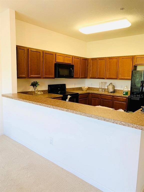 Kitchen view from dining room with island overlook