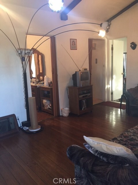 Beautiful hardwood floors throughout, & extra high ceilings