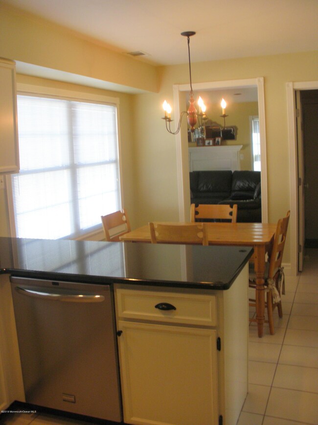 View of kitchen to family room