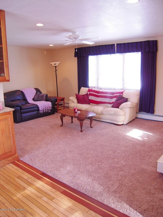 Spacious Living Room enjoys morning sun