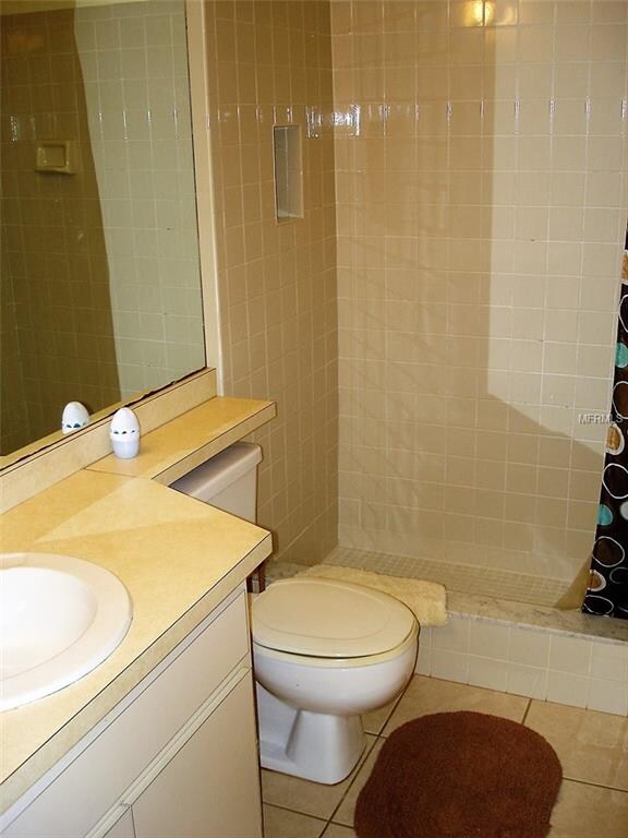 Master bathroom with walk-in shower.