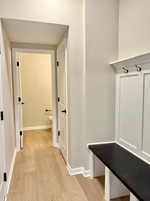 Mud room, boot bench and 1/2 bath