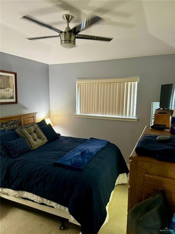 Bedroom with carpet floors and ceiling fan