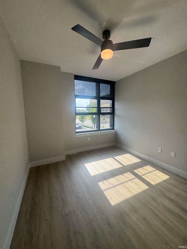 Enjoy your main bedroom with natural light and a ceiling fan!