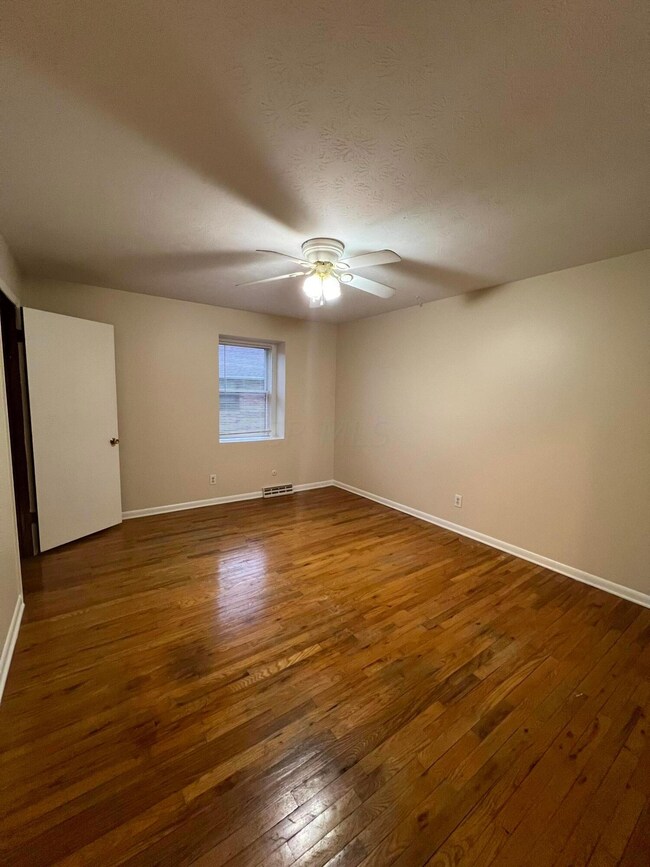 Main bedroom with ceiling fan